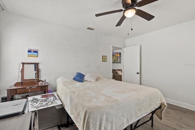 4444 5th Ave S, Saint Petersburg, FL 33711 - bedroom with wood finished floors and a ceiling fan