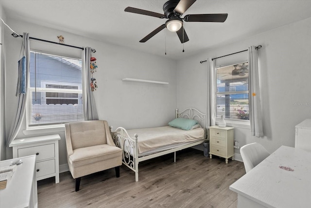 4444 5th Ave S, Saint Petersburg, FL 33711 - bedroom with light wood-style floors and a ceiling fan
