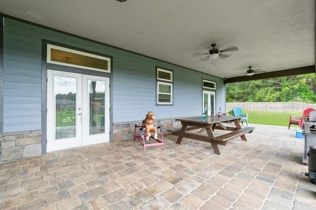 6813 SW 83rd Ter, Lake Butler, FL 32054 - view of patio / terrace featuring french doors, outdoor dining area, and ceiling fan