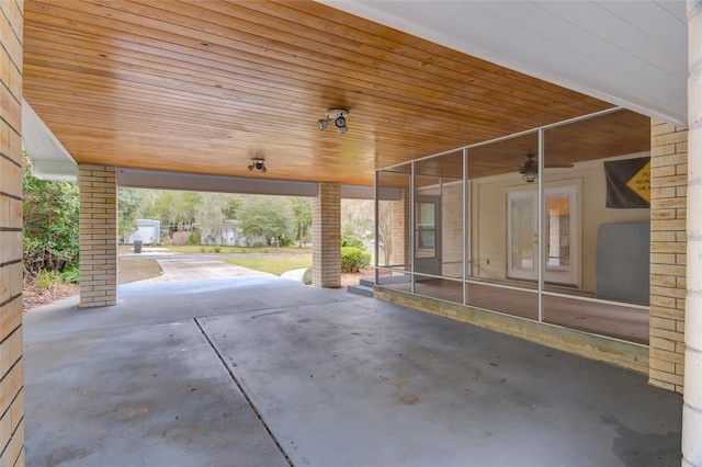 1318 NW 7th Rd, Gainesville, FL 32603 - view of patio / terrace featuring a sunroom
