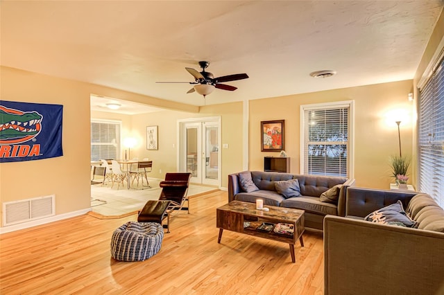 1318 NW 7th Rd, Gainesville, FL 32603 - living area with light wood-type flooring and ceiling fan