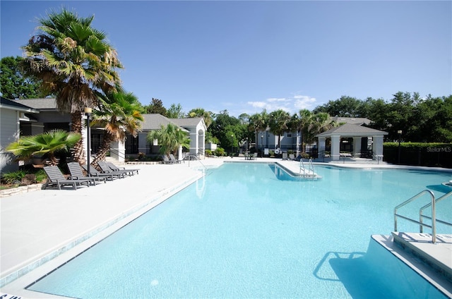 3705 SW 27th St Unit 223, Gainesville, FL 32608 - community pool with a gazebo and a patio