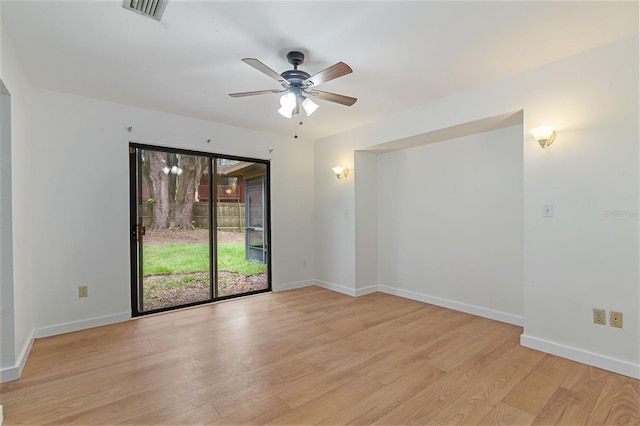 1745 NW 42nd Ave, Gainesville, FL 32605 - empty room featuring light wood-style floors and a ceiling fan