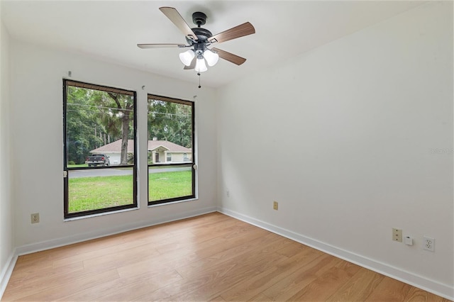 1745 NW 42nd Ave, Gainesville, FL 32605 - empty room featuring light wood-style floors and a ceiling fan