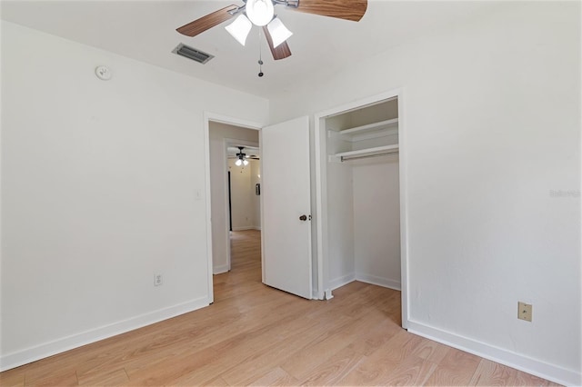 1745 NW 42nd Ave, Gainesville, FL 32605 - unfurnished bedroom featuring light wood-type flooring, a closet, and ceiling fan