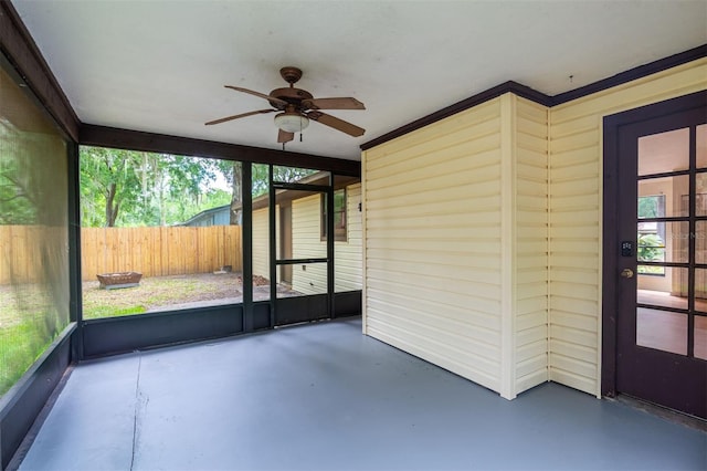 1745 NW 42nd Ave, Gainesville, FL 32605 - unfurnished sunroom with ceiling fan and healthy amount of natural light