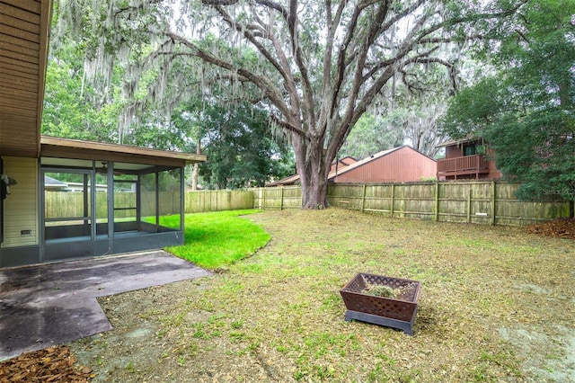1745 NW 42nd Ave, Gainesville, FL 32605 - fenced backyard with a sunroom