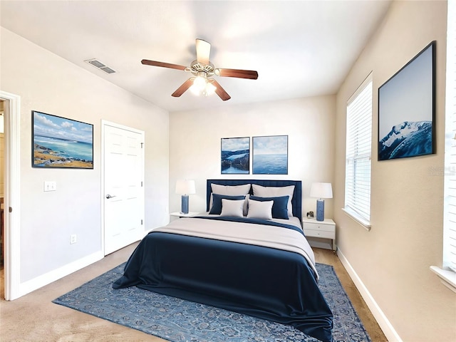 2508 SW 35th Pl Unit L-70, Gainesville, FL 32608 - carpeted bedroom featuring baseboards and ceiling fan