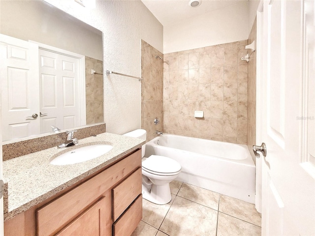 2508 SW 35th Pl Unit L-70, Gainesville, FL 32608 - bathroom featuring vanity, shower / bathtub combination, tile patterned floors, and a textured wall