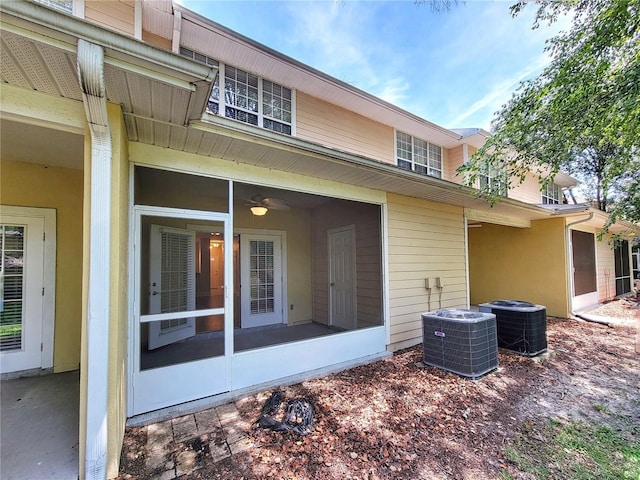 2508 SW 35th Pl Unit L-70, Gainesville, FL 32608 - back of house featuring a sunroom