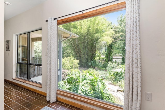 6501 NW 16th Pl, Gainesville, FL 32605 - entryway with dark tile patterned flooring and healthy amount of natural light