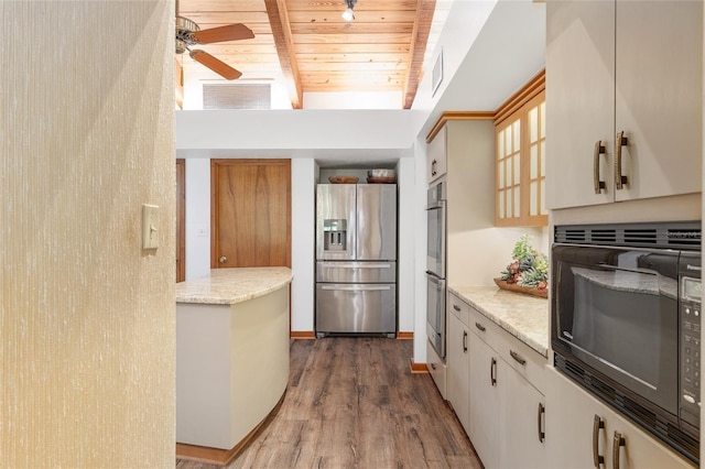 6501 NW 16th Pl, Gainesville, FL 32605 - kitchen with appliances with stainless steel finishes, a wood ceiling with exposed beams, a ceiling fan, wood finished floors, and glass insert cabinets
