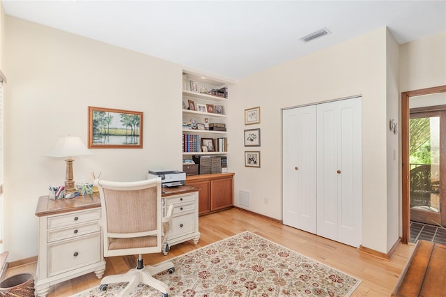 6501 NW 16th Pl, Gainesville, FL 32605 - office space featuring light wood-type flooring and built in features