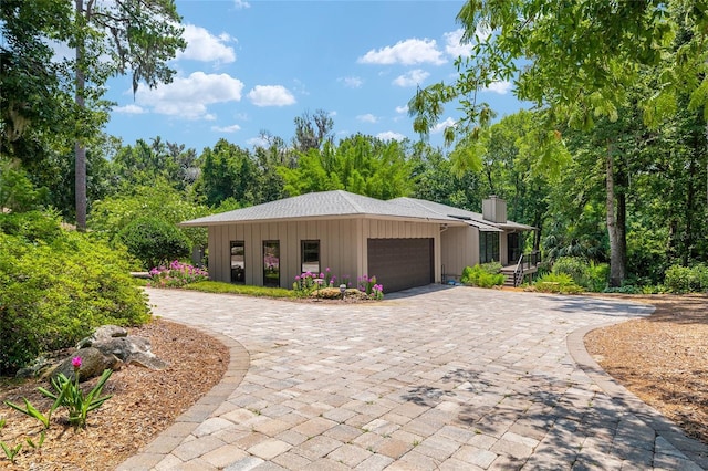 6501 NW 16th Pl, Gainesville, FL 32605 - garage with decorative driveway
