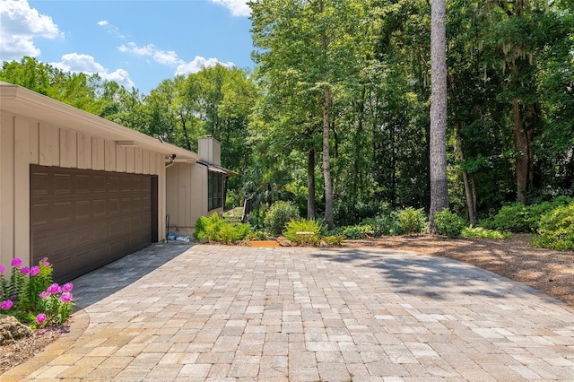 6501 NW 16th Pl, Gainesville, FL 32605 - garage featuring decorative driveway