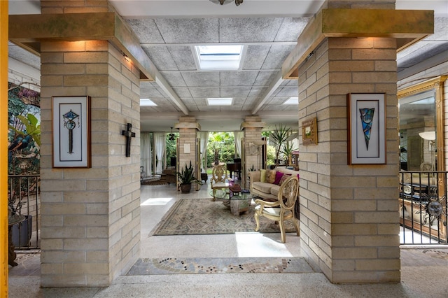 2010 NW 32nd Ter, Gainesville, FL 32605 - corridor with speckled floor and ornate columns