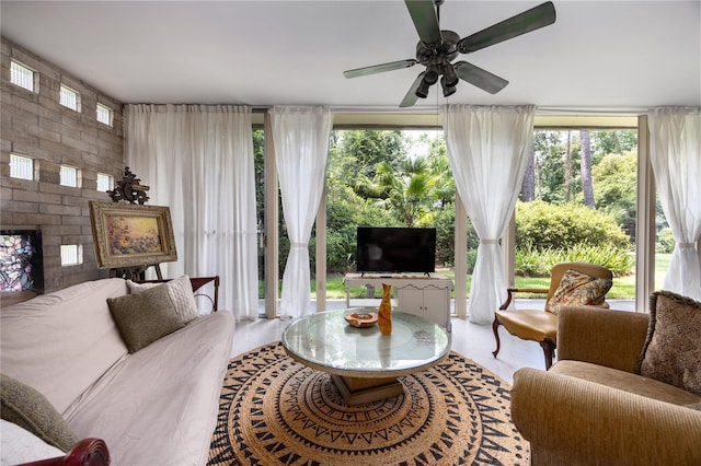 2010 NW 32nd Ter, Gainesville, FL 32605 - living area with ceiling fan and plenty of natural light