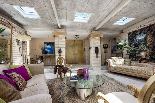 2010 NW 32nd Ter, Gainesville, FL 32605 - living room featuring a skylight and beamed ceiling