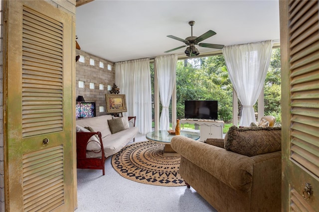 2010 NW 32nd Ter, Gainesville, FL 32605 - living area featuring a ceiling fan and speckled floor