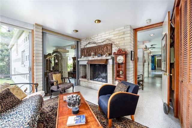 2010 NW 32nd Ter, Gainesville, FL 32605 - living room with a fireplace and speckle patterned floor