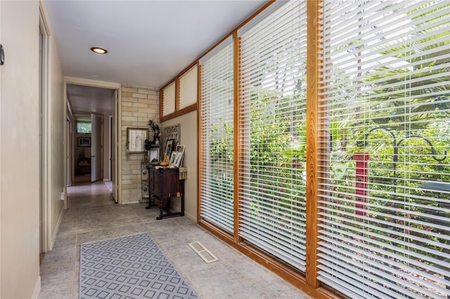 2010 NW 32nd Ter, Gainesville, FL 32605 - hallway featuring light tile patterned floors