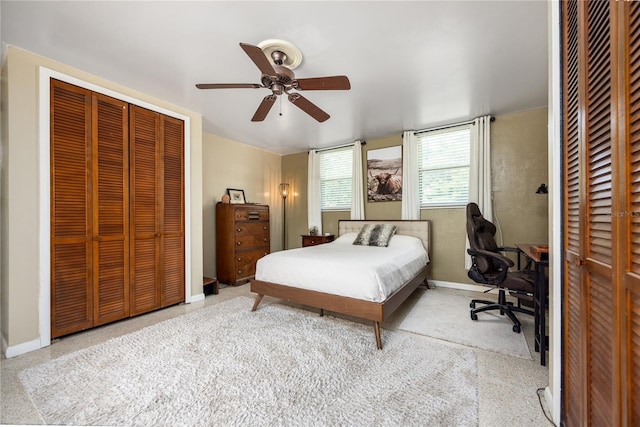 2010 NW 32nd Ter, Gainesville, FL 32605 - bedroom with an office area and ceiling fan