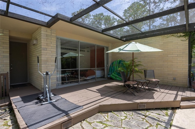 2010 NW 32nd Ter, Gainesville, FL 32605 - wooden terrace featuring glass enclosure