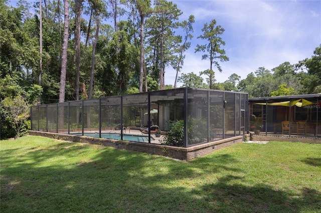 2010 NW 32nd Ter, Gainesville, FL 32605 - rear view of house with a lawn