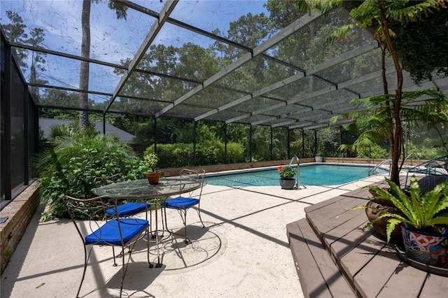 2010 NW 32nd Ter, Gainesville, FL 32605 - swimming pool with a patio and glass enclosure