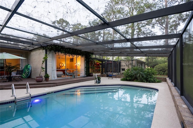 2010 NW 32nd Ter, Gainesville, FL 32605 - outdoor pool featuring a lanai and a patio