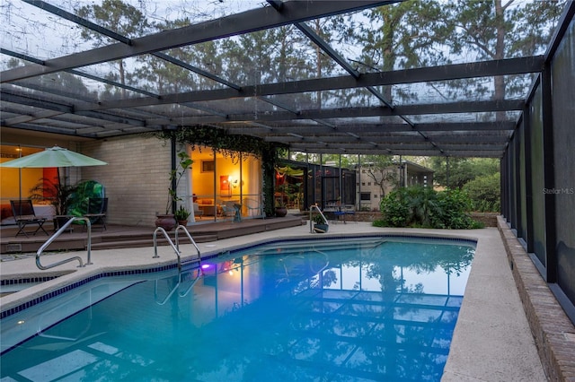 2010 NW 32nd Ter, Gainesville, FL 32605 - swimming pool with a patio area and glass enclosure