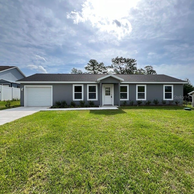 15433 SW 47th Avenue Rd, Ocala, FL 34473 - ranch-style home with driveway, an attached garage, and stucco siding