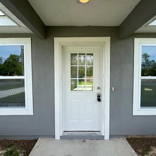 15433 SW 47th Avenue Rd, Ocala, FL 34473 - doorway to property featuring stucco siding