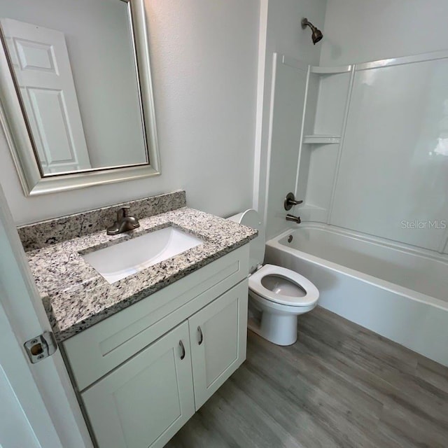15433 SW 47th Avenue Rd, Ocala, FL 34473 - full bath featuring vanity, bathtub / shower combination, and wood finished floors