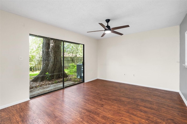4325 NW 41st Pl Unit 6, Gainesville, FL 32606 - spare room with a ceiling fan, wood finished floors, and a textured ceiling
