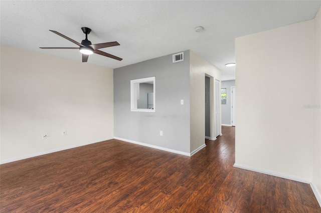 4325 NW 41st Pl Unit 6, Gainesville, FL 32606 - spare room with wood finished floors, a ceiling fan, and a smoke detector