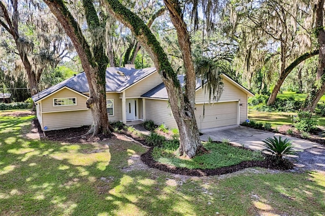 6505 SW 135th Pl, Archer, FL 32618 - ranch-style home featuring concrete driveway, a front lawn, and an attached garage