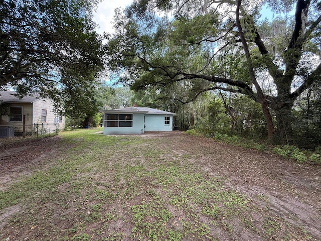 926 NW 24th Ave, Gainesville, FL 32609 - view of yard featuring a sunroom