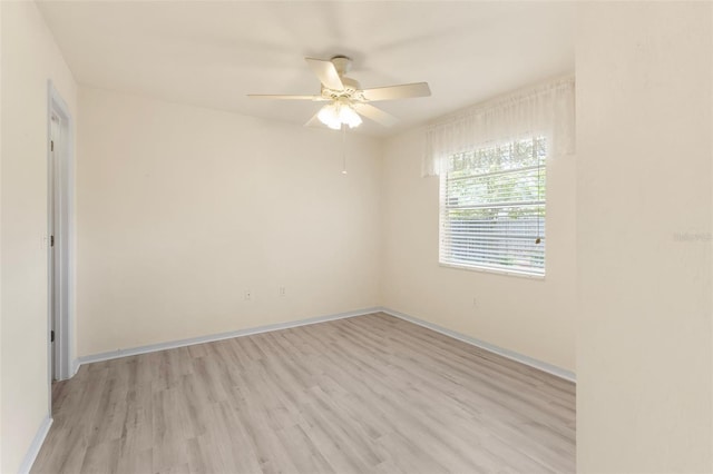 3846 NW 62nd Pl, Gainesville, FL 32653 - spare room featuring light wood-style floors and a ceiling fan