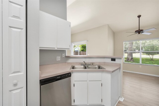 3846 NW 62nd Pl, Gainesville, FL 32653 - kitchen with dishwasher, light countertops, ceiling fan, and white cabinets