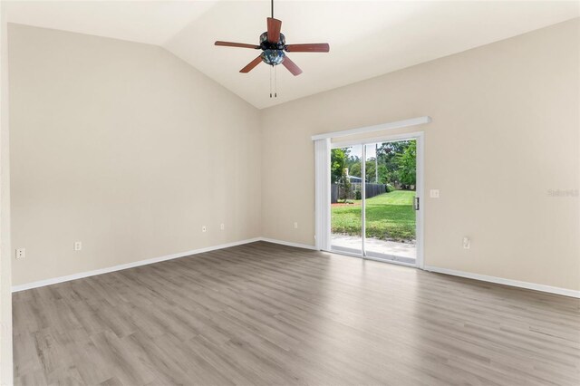 3846 NW 62nd Pl, Gainesville, FL 32653 - empty room featuring wood finished floors, lofted ceiling, and ceiling fan