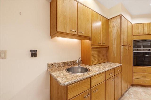 1225 NW 23rd Ter, Gainesville, FL 32605 - kitchen with a sink and oven