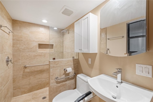 1225 NW 23rd Ter, Gainesville, FL 32605 - bathroom with tiled shower and recessed lighting