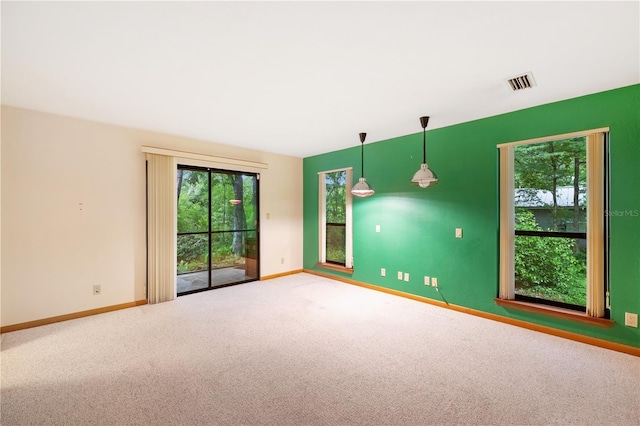 1225 NW 23rd Ter, Gainesville, FL 32605 - carpeted empty room with baseboards