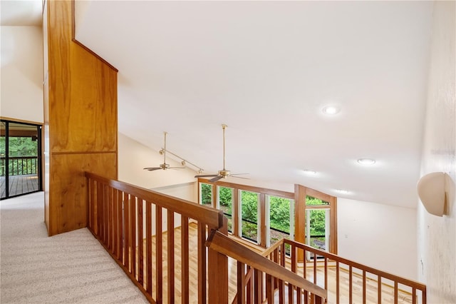 1225 NW 23rd Ter, Gainesville, FL 32605 - hallway featuring an upstairs landing, light colored carpet, lofted ceiling, and recessed lighting