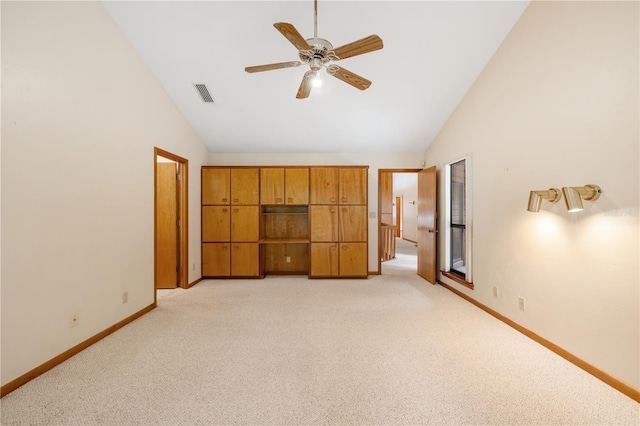 1225 NW 23rd Ter, Gainesville, FL 32605 - unfurnished bedroom featuring light colored carpet, high vaulted ceiling, and ceiling fan