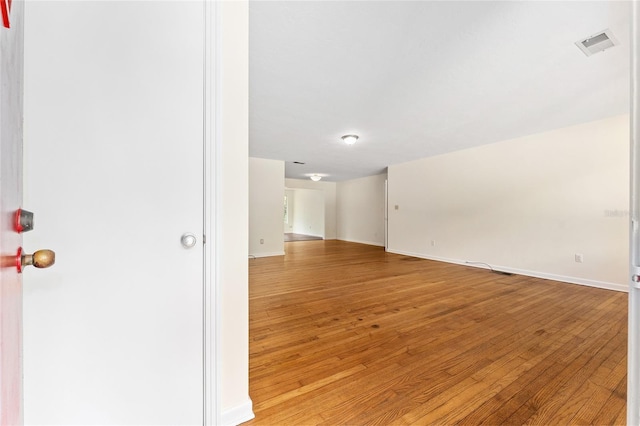 3857 SW 4th Pl, Gainesville, FL 32607 - spare room featuring light wood finished floors