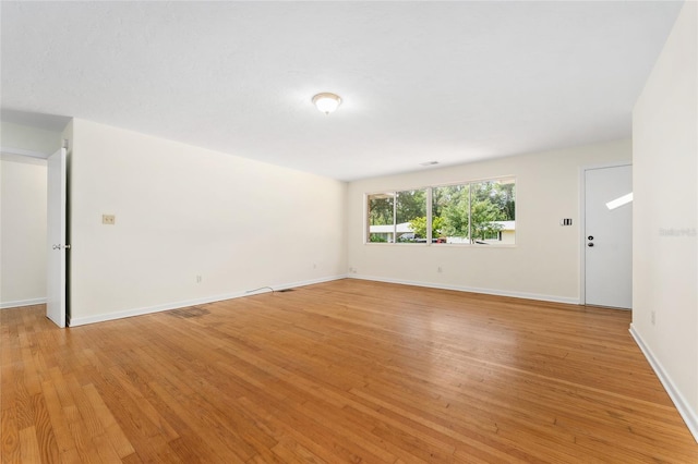 3857 SW 4th Pl, Gainesville, FL 32607 - unfurnished room with light wood-style flooring