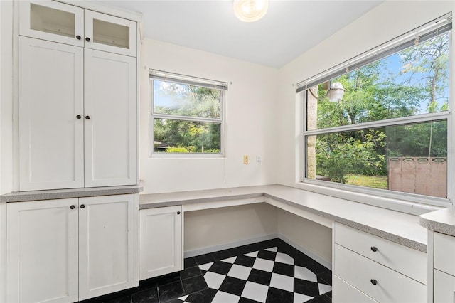 3857 SW 4th Pl, Gainesville, FL 32607 - unfurnished office with dark flooring and built in study area