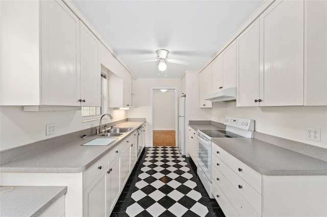 3857 SW 4th Pl, Gainesville, FL 32607 - kitchen with white appliances, under cabinet range hood, white cabinetry, a ceiling fan, and light countertops